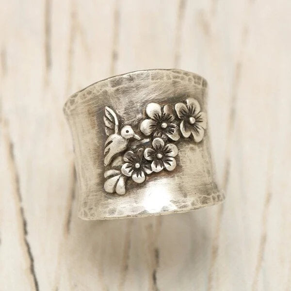 Elegantly gestalteter Vogelblume Breitbandring