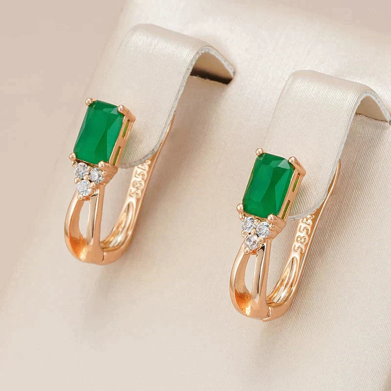 Fascinating green crystal earrings with sparkling zirconias in elegant gold design