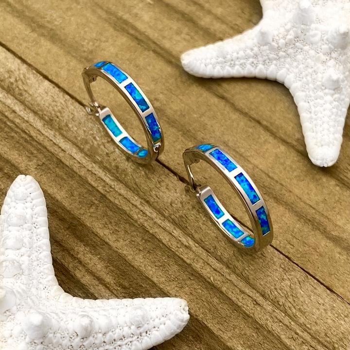 Elegante Silberringe mit bezauberndem Opal – inspiriert von den Strömungen des Ozeans