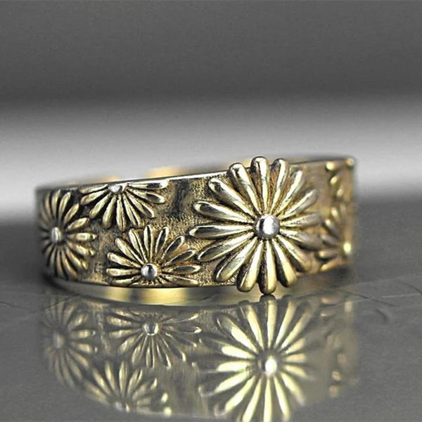 Eleganter Goldring mit Gänseblümchen-Design