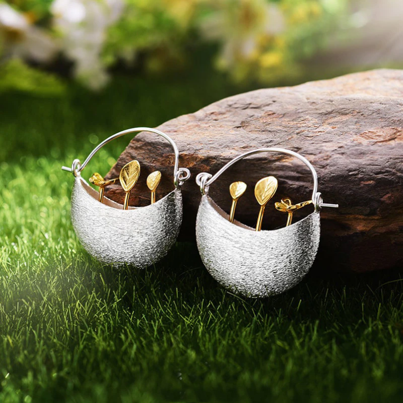Elegante Silberohrringe mit vergoldetem Blumenkorb-Design