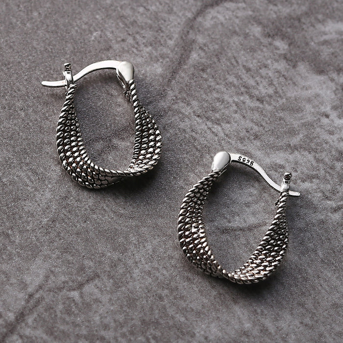 Elegante unregelmäßige Silberohrringe im Vintage-Stil