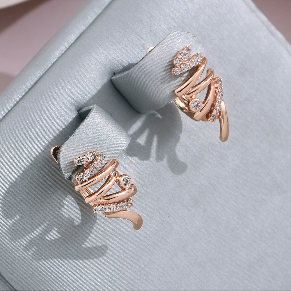Strahlende Spiral-Ohrringe aus feinstem Gold – der Inbegriff von Eleganz!