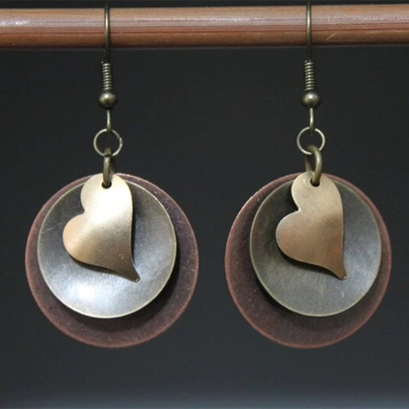 Elegante Boho Herzohrringe in Silber und Gold