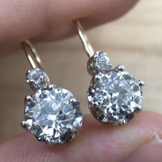 Elegante Vintage-Platin-Ohrringe mit strahlenden Zirkonia-Steinen