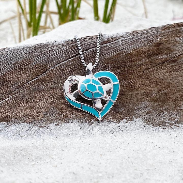 Elegante Schildkrötenherz-Halskette in strahlendem Blau und edlem Silber