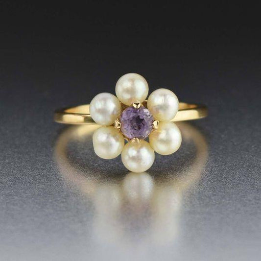 Vintage Gold Perlenblütenring mit strahlendem lila Kristall