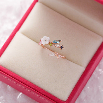 Eleganter verstellbarer Wildflower-Ring mit funkelnden Gold-Edelsteinen