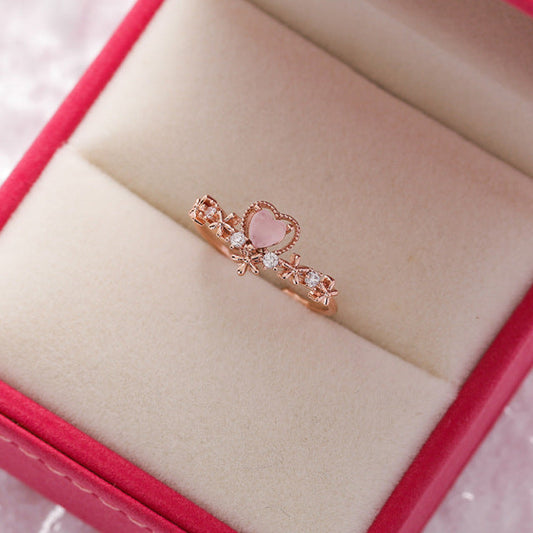 Eleganter Goldring mit verstellbarem Design, funkelndem Zirkonia und zartem rosa Herz
