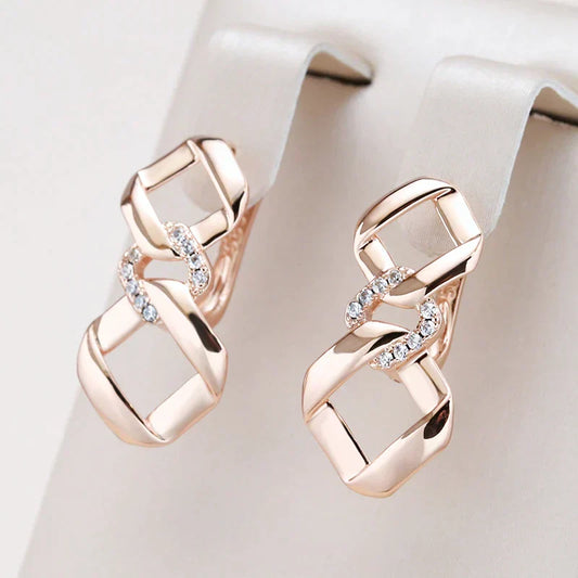 Stylische goldene Ohrhänger mit Zirkonia und edlem Knotendesign