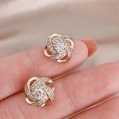 Blühende Spiral-Kreuzohrringe für einen eleganten Look