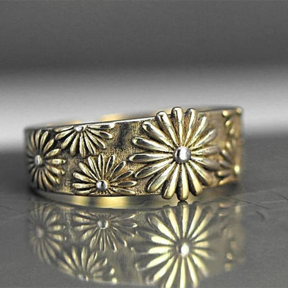 Eleganter Goldring mit Gänseblümchen-Design