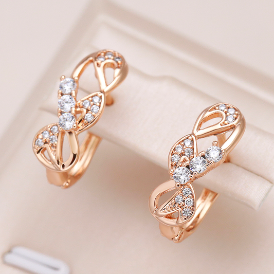 Glitzernde Kristall-Ohrringe mit eleganter Goldschleife