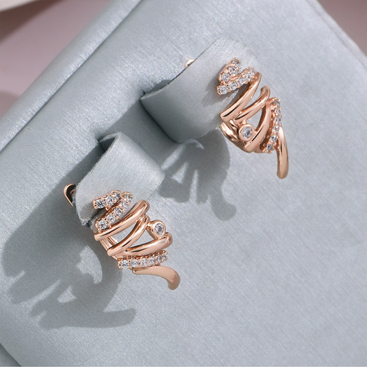 Strahlende Spiral-Ohrringe aus feinstem Gold – der Inbegriff von Eleganz!