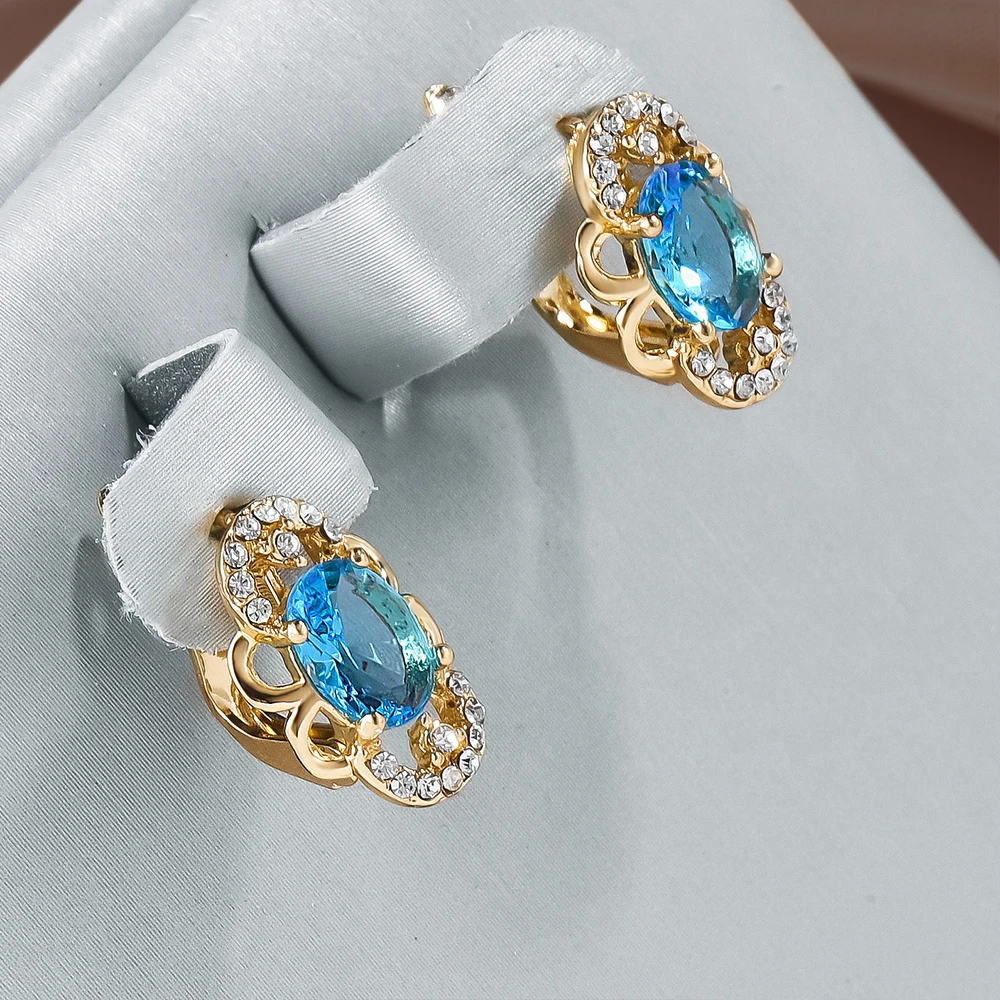 Strahlende Kristall-Ohrringe im edlen Gold-Design