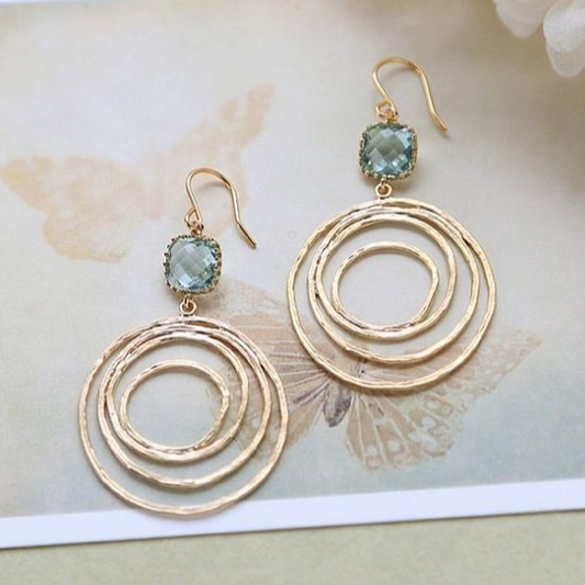 Elegante Vintage-Goldohrringe mit funkelnden Zirkonia-Spiralen