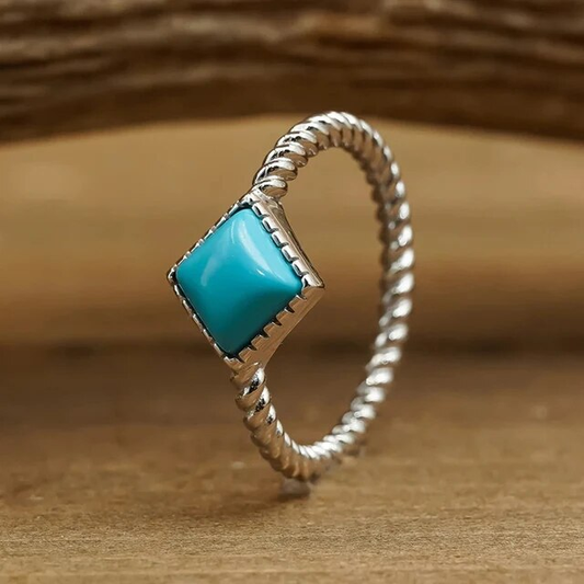 Vintage Silberring mit Türkisen im Flecht-Design