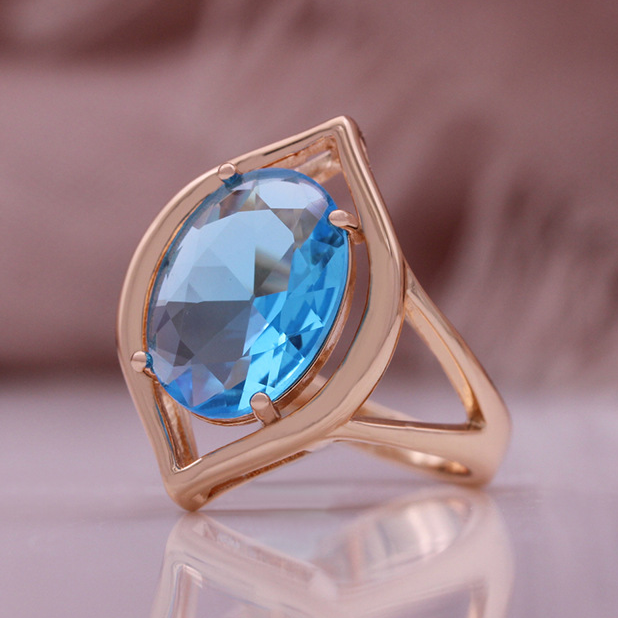 Eleganter Vintage-Ring mit glanzvollem blauen Kristall in edlem Roségold