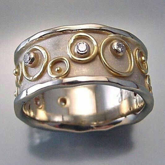Beeindruckender vintage Hohlring aus Silber und Gold mit Intarsien-Zirkonia-Akzenten